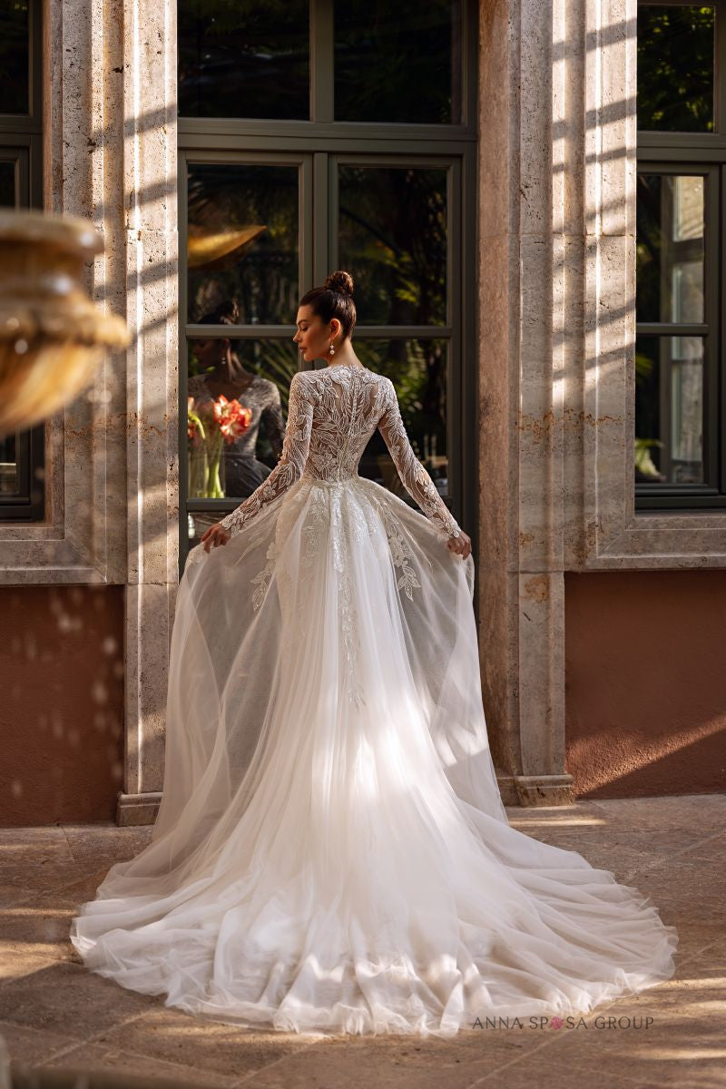 Anna Sposa Zinel Brautkleid – Elfenbeinfarbenes Meerjungfrauenkleid aus floraler Spitze mit langen Ärmeln und abnehmbarer Schleppe