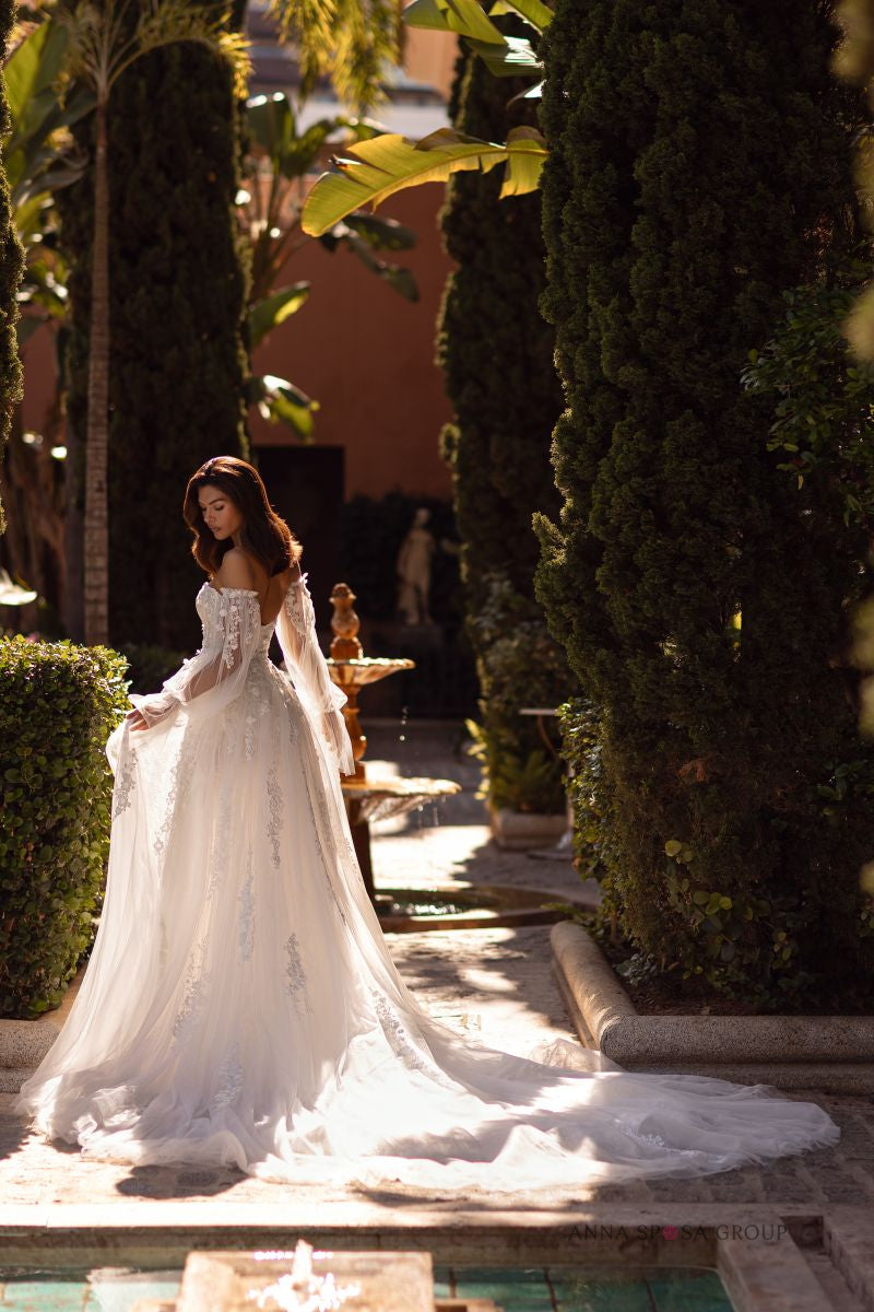 Robe de mariée Anna Sposa Hitomi – Sirène ivoire en dentelle avec manches, traîne et shorts amovibles